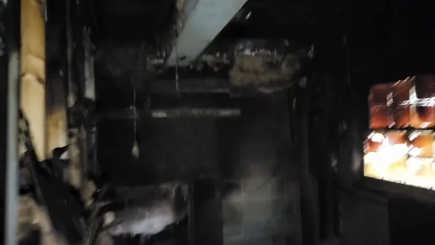 Burned and soot-covered room after a house fire