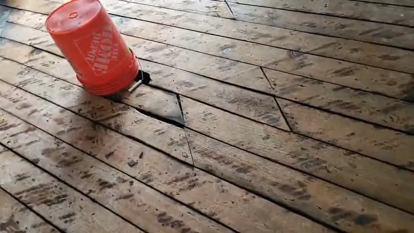 Damaged subfloor after a fire