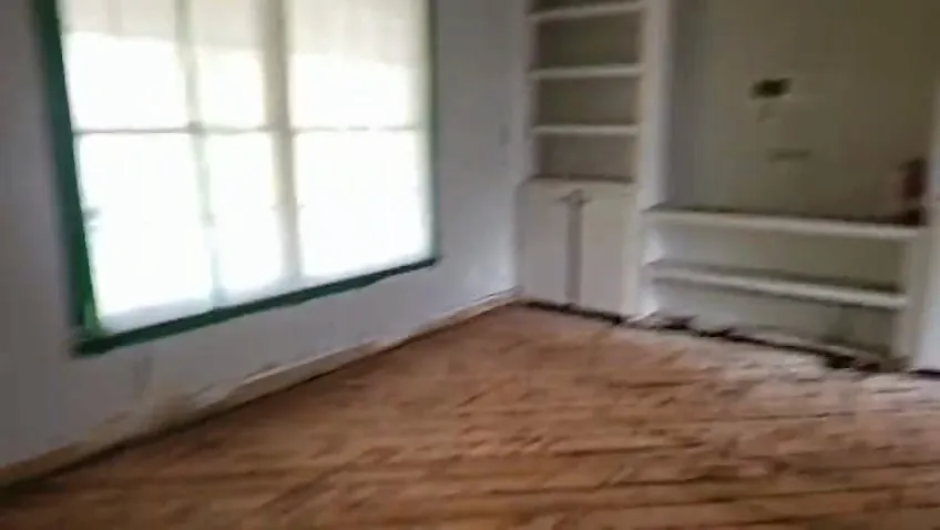 Room gutted down to the subfloor after a fire