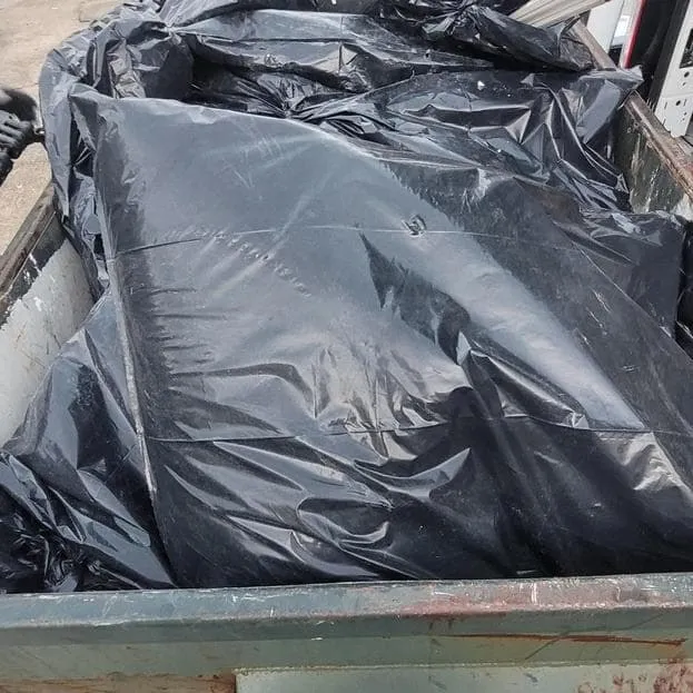 Contaminated debris bagged and loaded on the truck