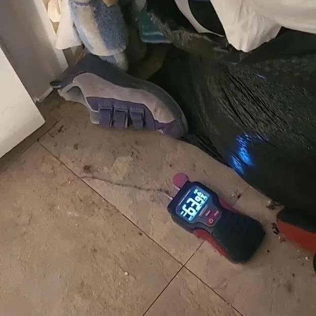 Moisture reading taken at the floor line