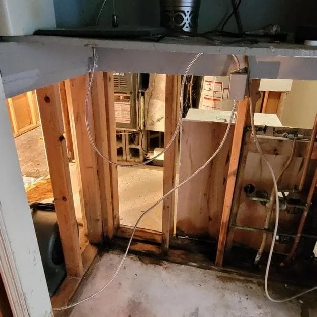 Wall cavity opened for inspection