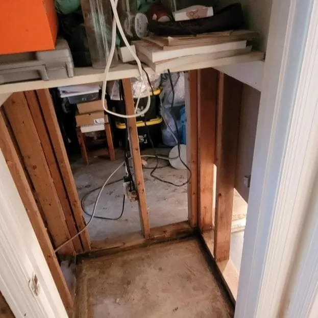 Basement hallway opened after water damage