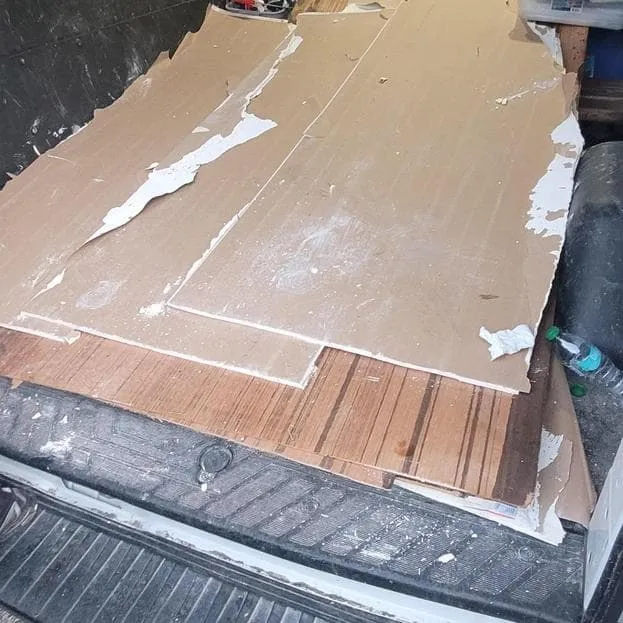 Contaminated drywall loaded for disposal