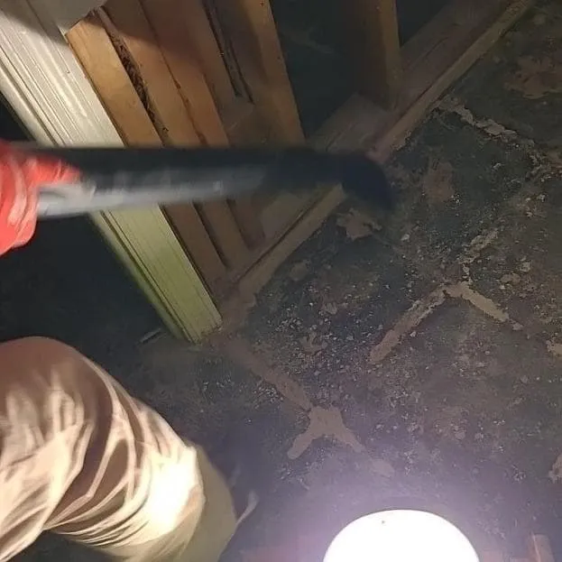 HEPA vacuum in use on framing