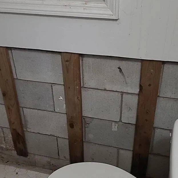 Cleaned block wall and framing