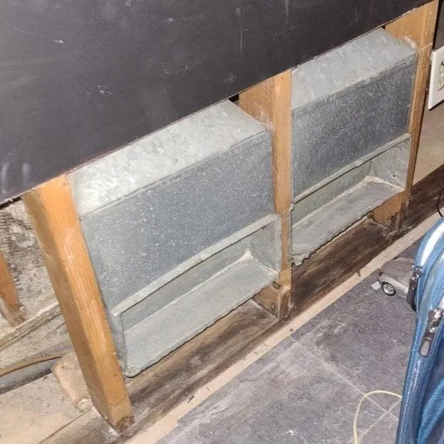 Ductwork exposed in an opened ceiling